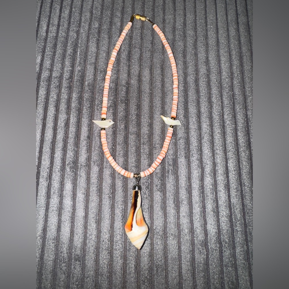 Elegant Beaded Necklace with Bird Accents with matching earrings.
